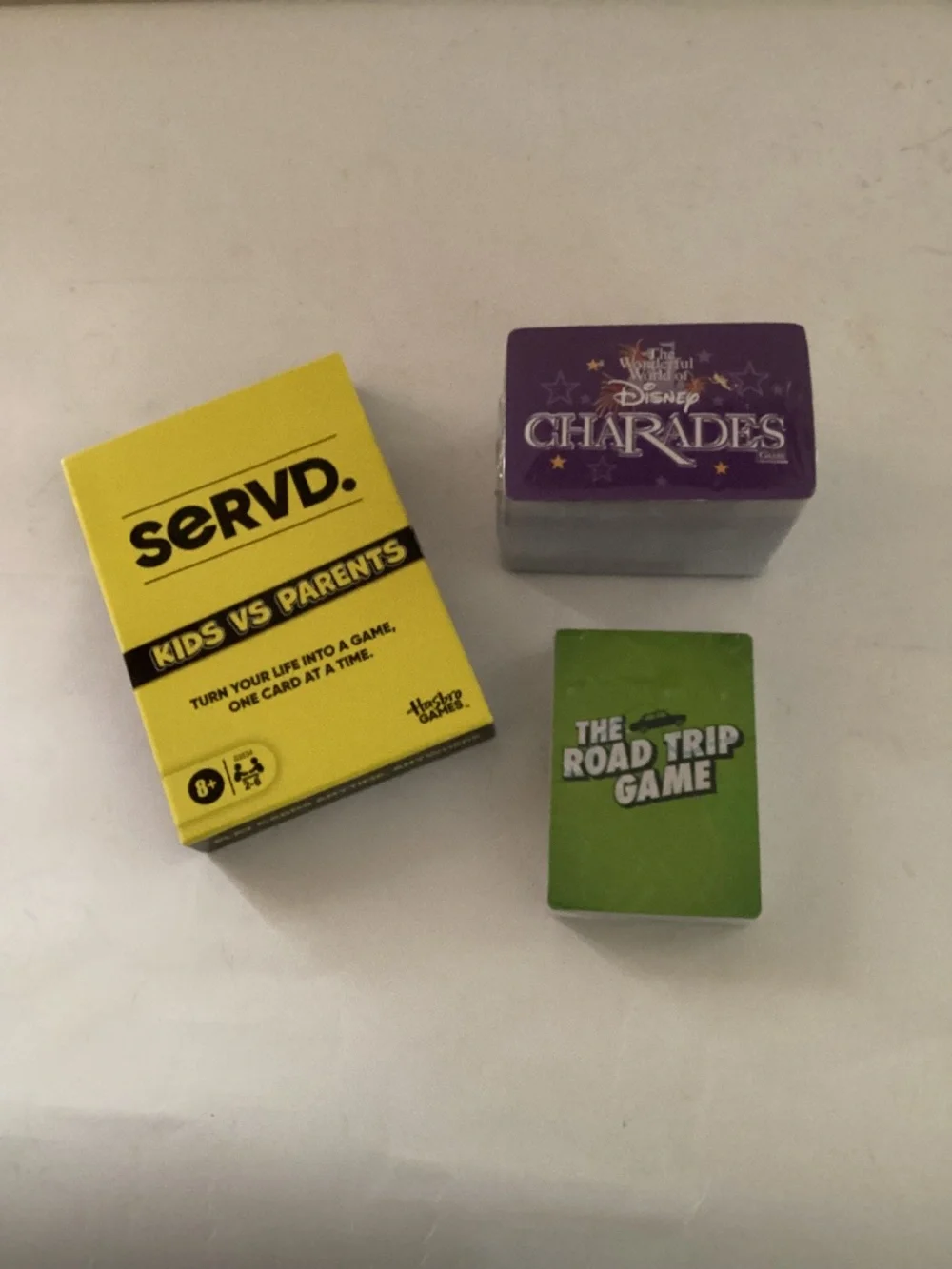 Set of 3 card games for family. Servd, Disney Charades and The Road Trip Game.